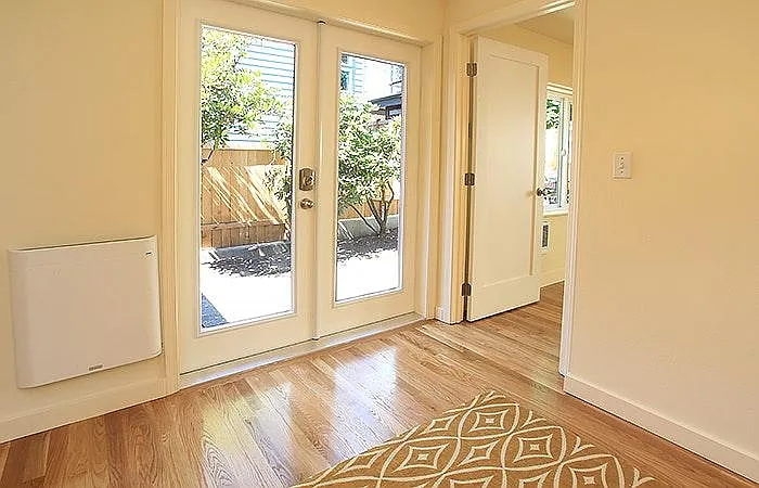 French doors from dining room to private and sunny patio