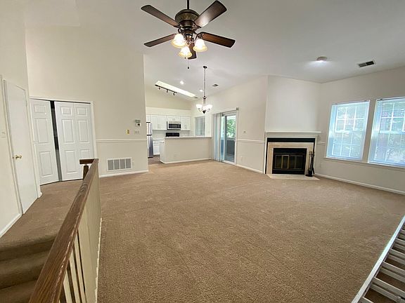 Spacious open living and dining. Soaring ceilings.