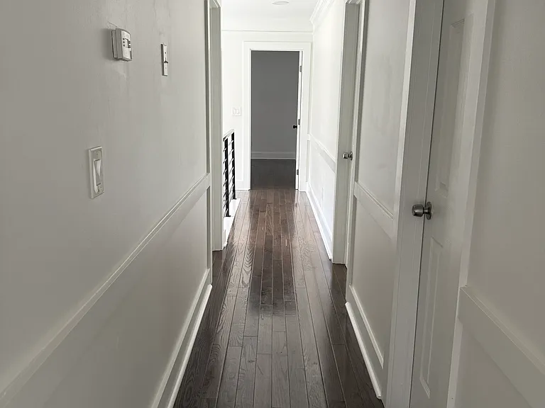 Long Hallway to all 4 rooms.