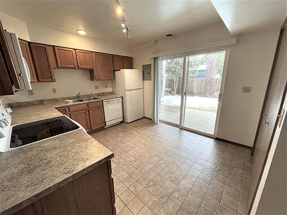 Walkout sliding glass doors to your private patio and the back yard