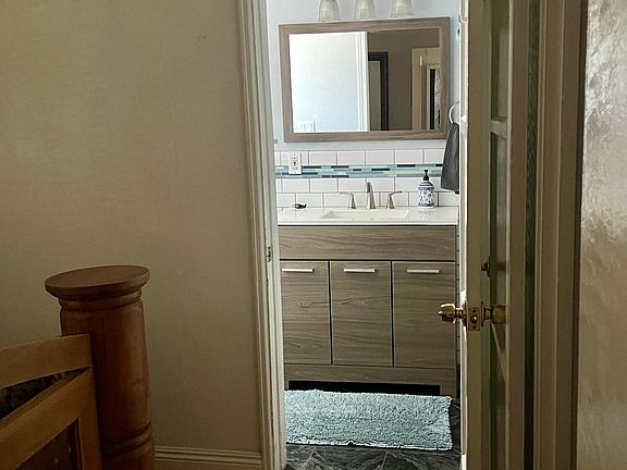 bathroom entrance off the bedroom