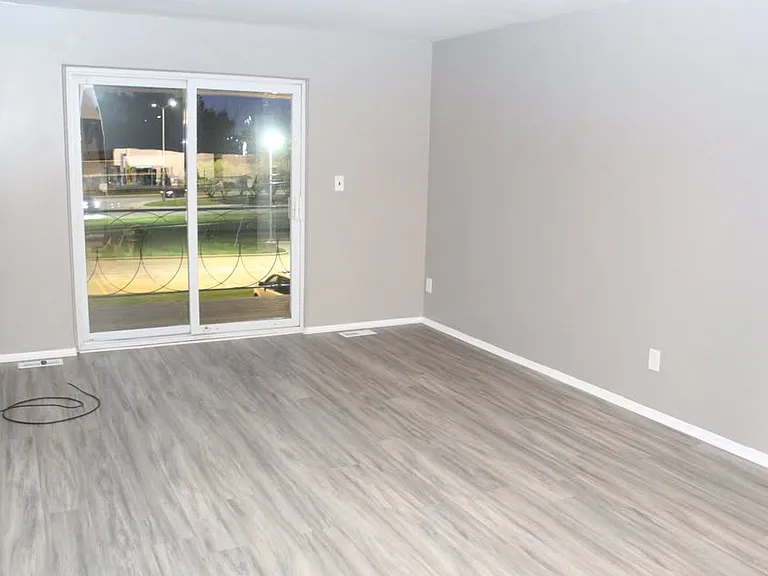 Livingroom looking out over the second floor balcony