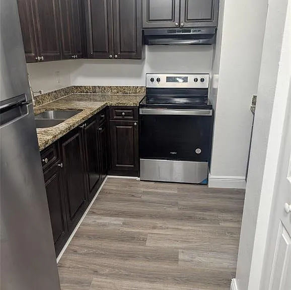 5861 NW 16th Pl #307 — Photo 2