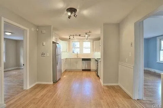 !st Floor Bedroom left- Kitchen/Dining center - Living room right
