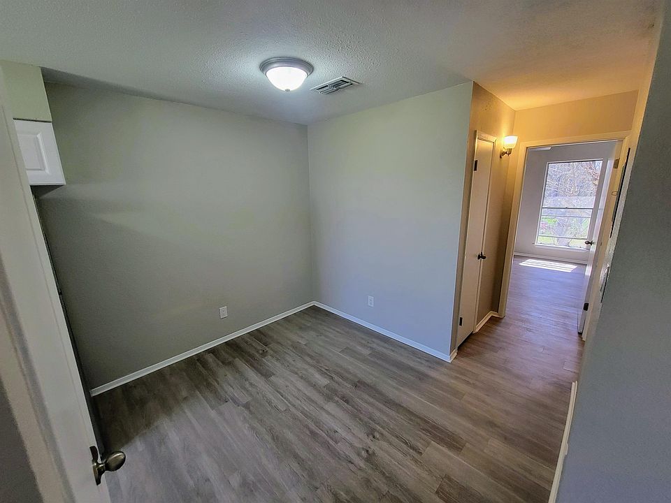 Dining area; hallway closet and bedroom #1 to right; kitchen pantry on left