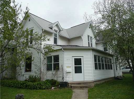 Front of house with enclosed front porch