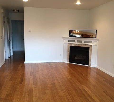 Living room, taken from entrance. Kitchen is to the left