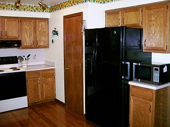 Pantry offers additional storage in Kitchen