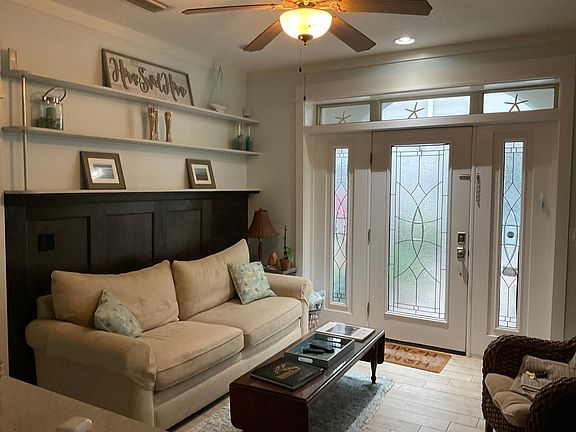 Raised panel accent wall and built in shelves