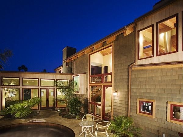Wonderful tropical setting, with a flagstone patio, hot tub, and fire pit