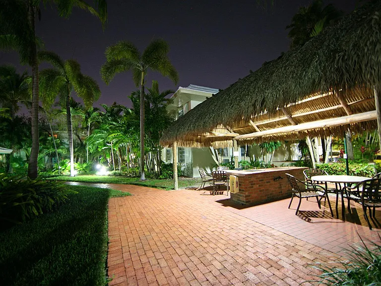 BBQ AT NIGHT UNDER THE TIKI HUT