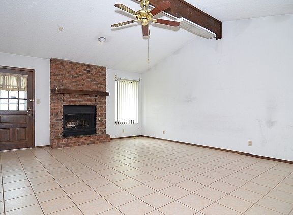 Open floor plan and vaulted ceiling
