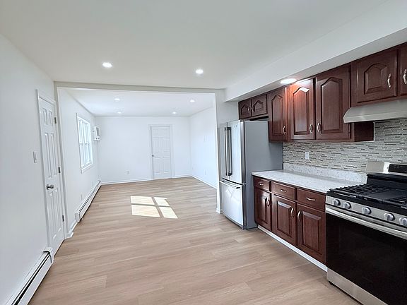 Open-concept kitchen and livingroom