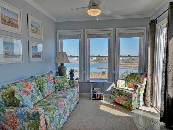 The Sunroom doubles as living space and the sofa folds out for guests. Our favorite place to greet the day with coffee or tea!