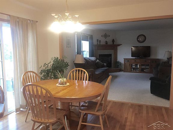 The dining area flows nicely between the living and kitchen spaces.