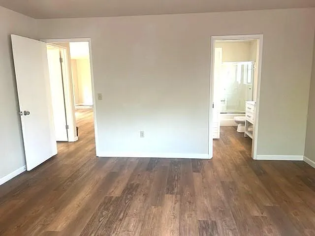 master bedroom opens onto the bathroom and hallway