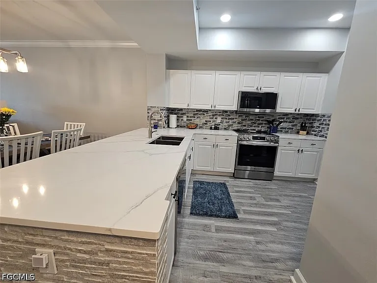 10700 Ravenna Way #204 — Photo 9