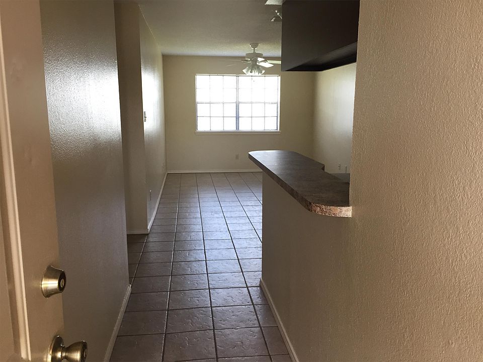 Entry way to living room and kitchen
