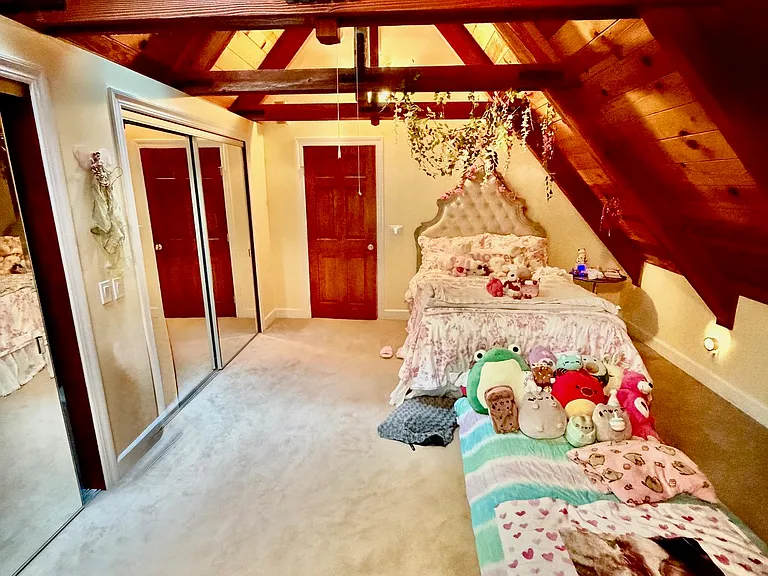 3rd floor, first bedroom.