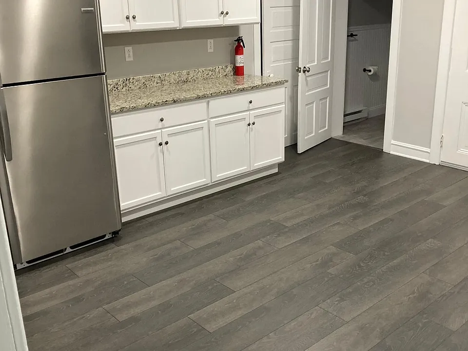 Large, recently remodeled kitchen with updated cabinets, granite counters, and stainless steel appliances
