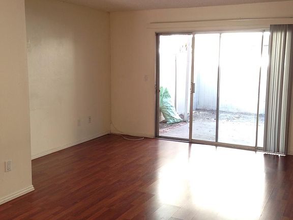 Living room that leads to backyard