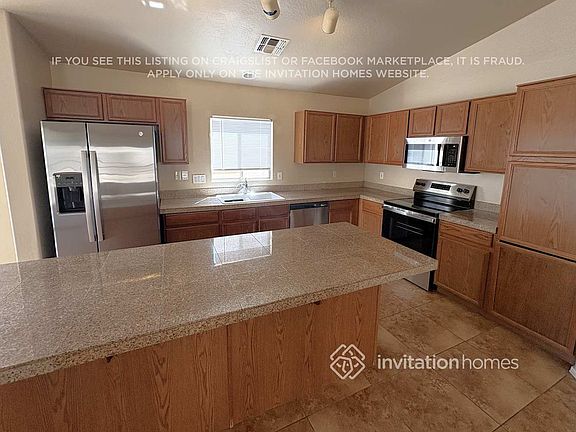 5th image of 12742 W Pershing St