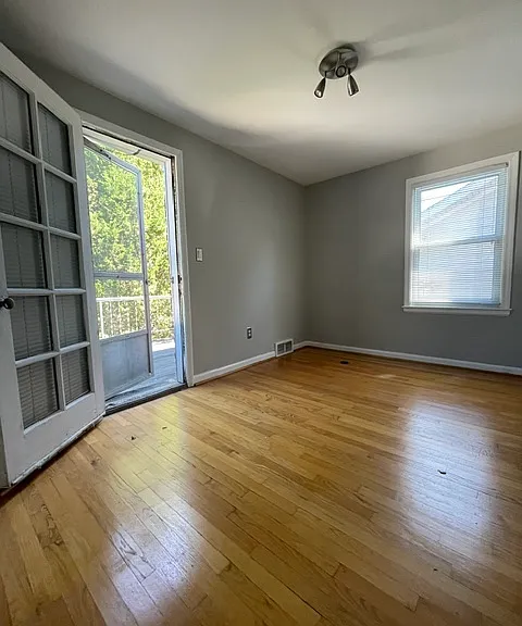 3rd bedroom w/ door exit to balcony