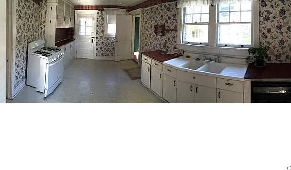 Large Kitchen w/ gas stove - needs renovations