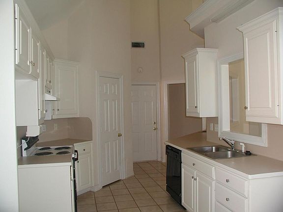 Kitchen with Pantry and Wet Bar with pass thru to Great Room
