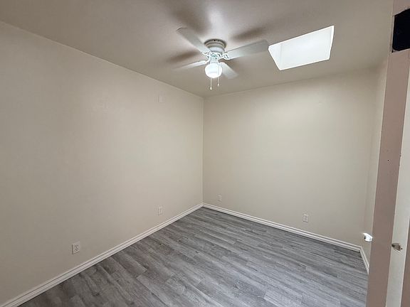kids room with sky light and closet - new flooors