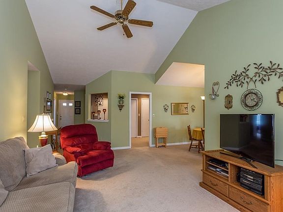 Grand great room with cathedral ceiling.  Notice the interesting architectural lines!