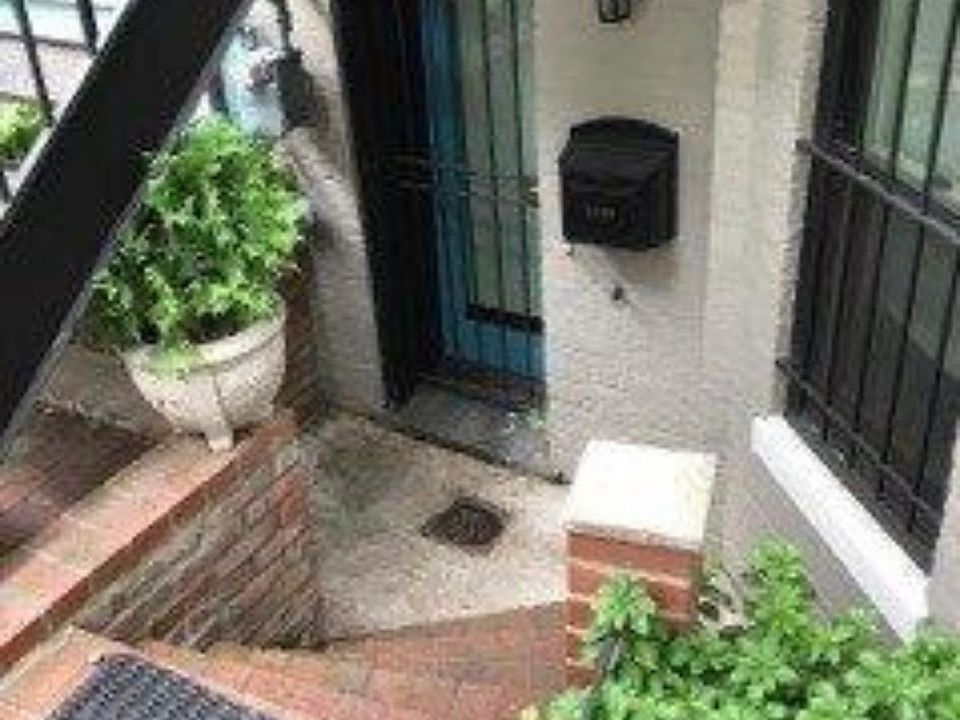 Front door. Also has back entrance opening to shared patio a d