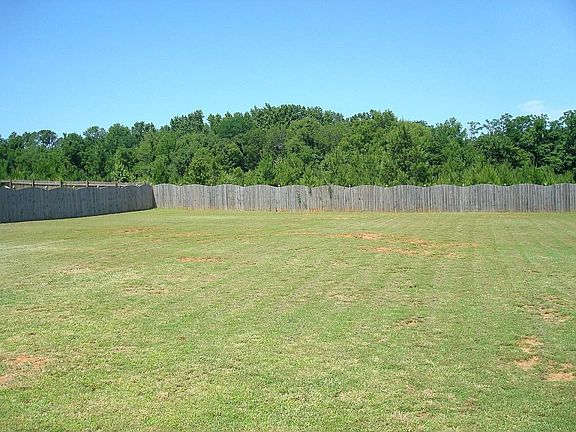Fenced in backyard. Almost half an acre!