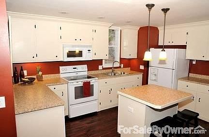 Kitchen
						:
						This newly renovated kitchen is spacious and open