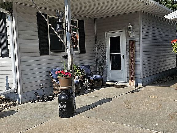 Back door & patiby driveway 