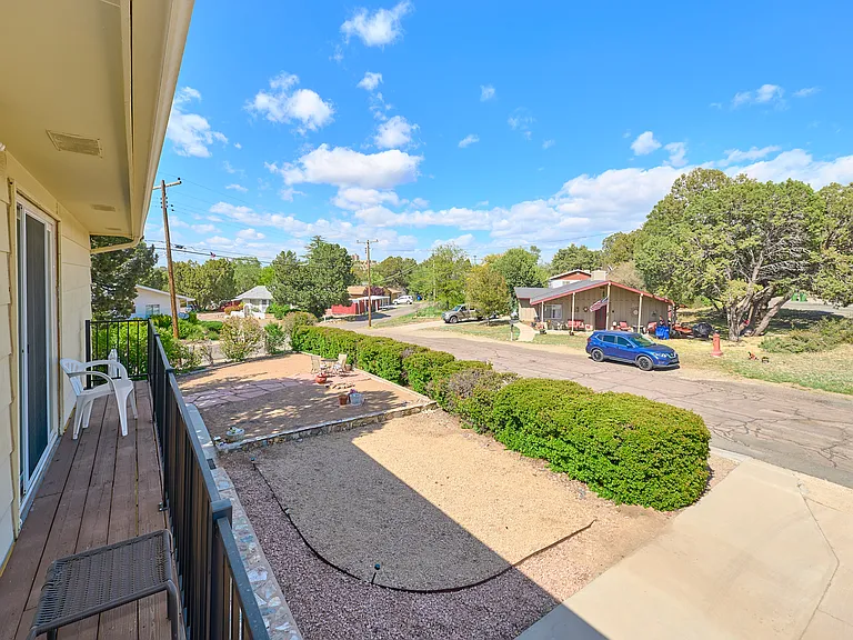 view from upper unit of the front yard and street