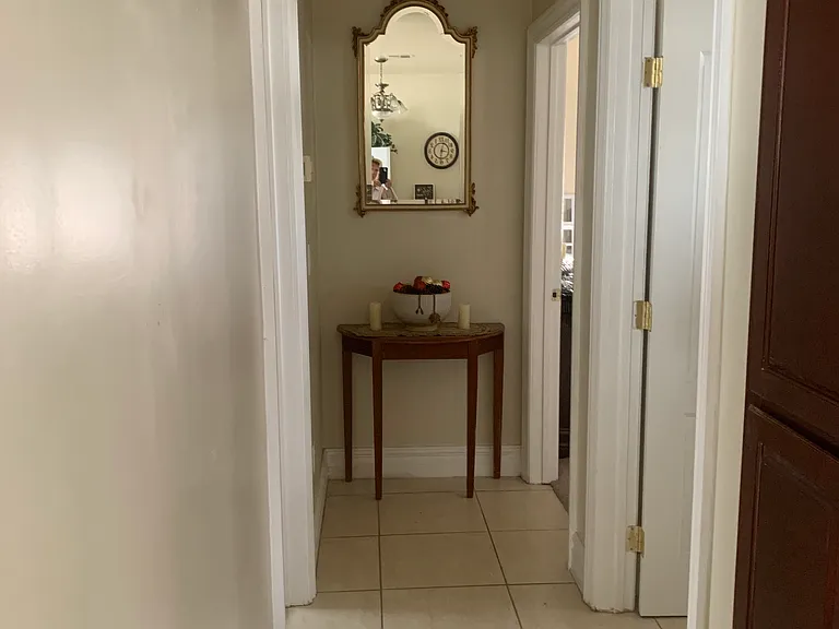 Hallway to bathroom/bedrooms