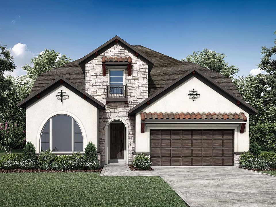 custom two-story home with stone and stucco exterior