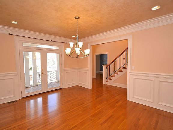 French doors lead to porch