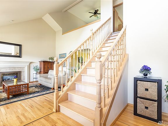 Spacious foyer opens to your living/dining room and loft above.
