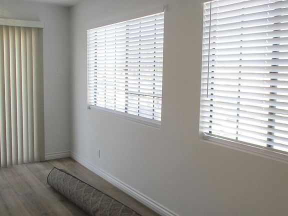 example of dining area with sliding door to balcony