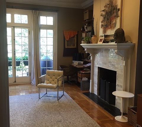 WOOD BURNING FIREPLACE IN LIVING ROOM