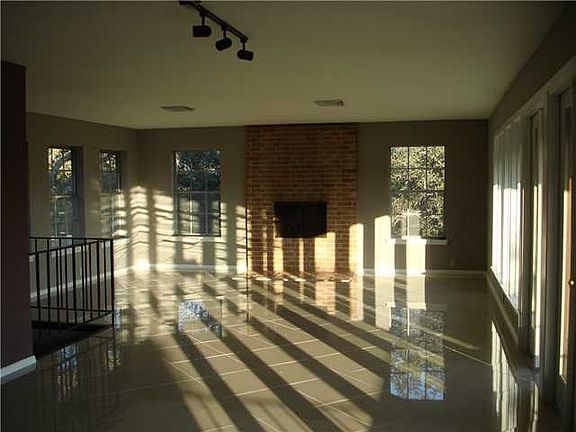 Den/Family/Great Room : Floor to ceiling windows flood this