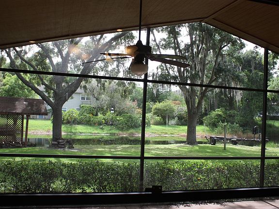 Large screened in patio overlooking Lake Butler canal