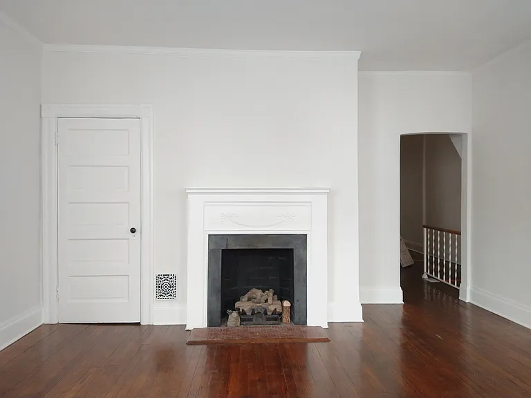 Living Room with gas fireplace and closet.