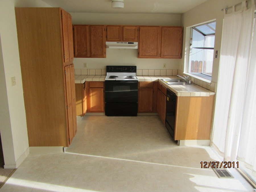"Large kitchen with lots of counter space and storage"