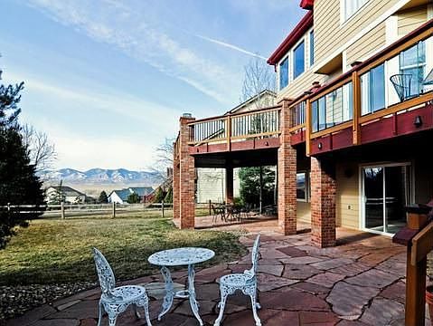 03- Stone patio &amp; two-tier deck