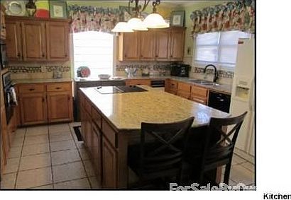 Large Updated Kitchen
						:
						Lots of gorgeous maple cabinets, granite counter tops and stone backsplash