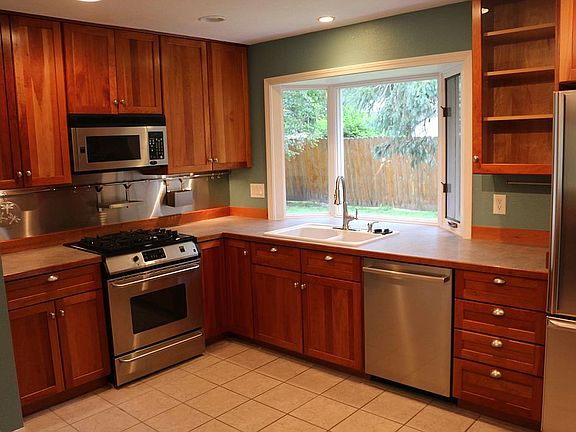 Cherry cabinets.