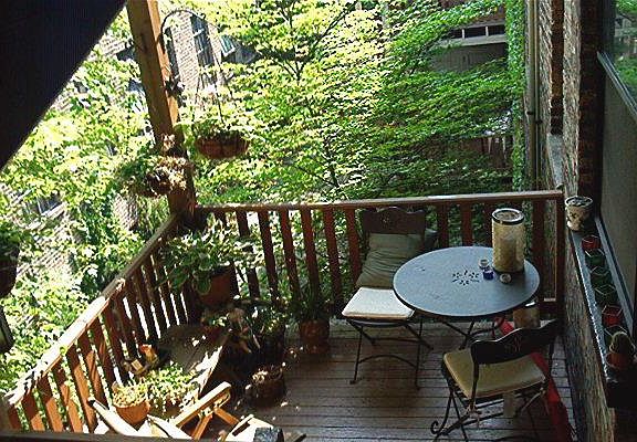 Private deck overlooks garden just off kitchen